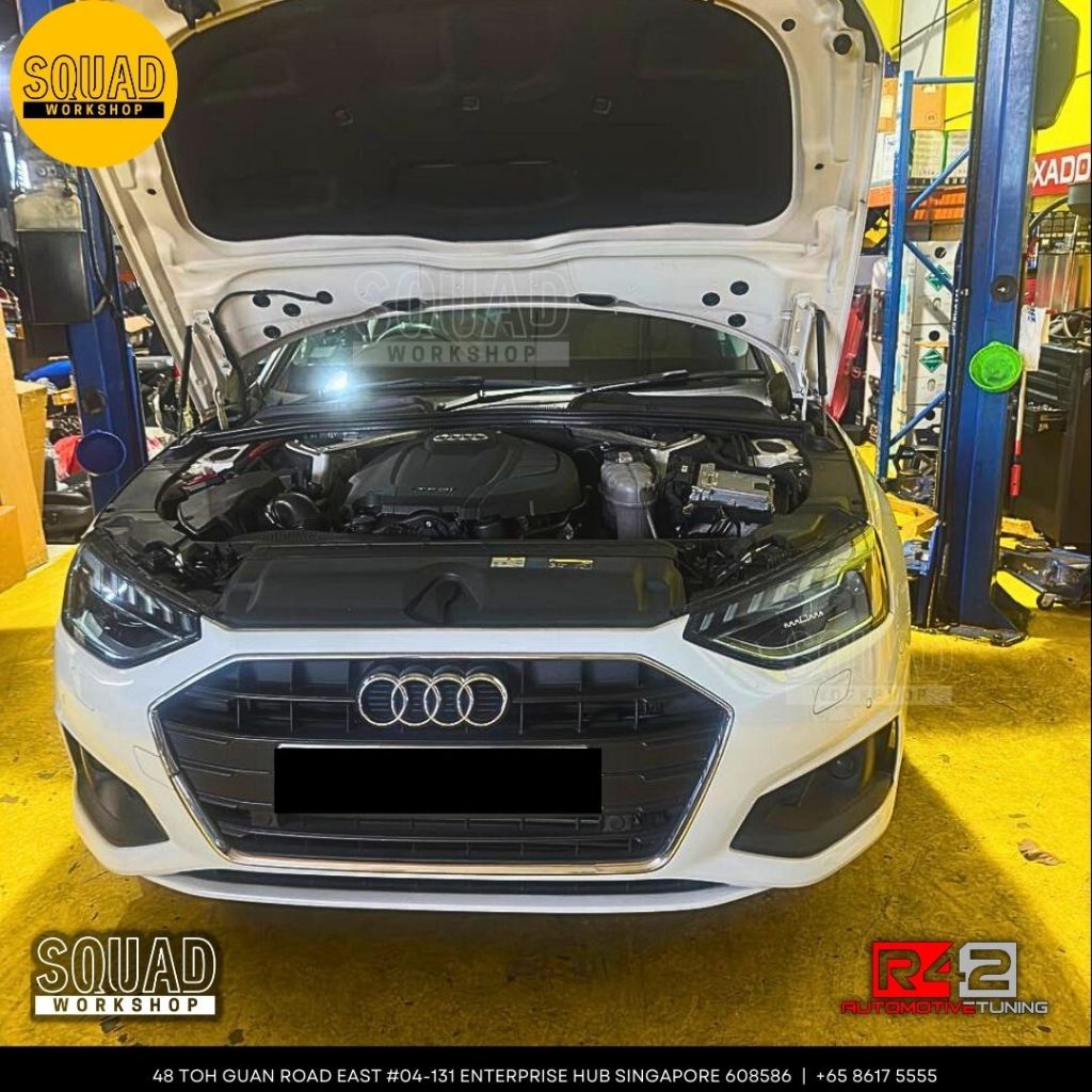 Audi A4 B9 undergoing suspension absorber, control arm, and engine gearbox mounting replacement with original Volkswagen parts at Squad Workshop Singapore