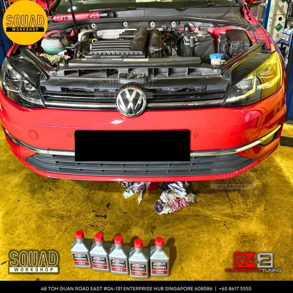 Volkswagen Golf 100k major servicing with water pump, timing belt, suspension, and engine mounting replacement at Squad Workshop Singapore