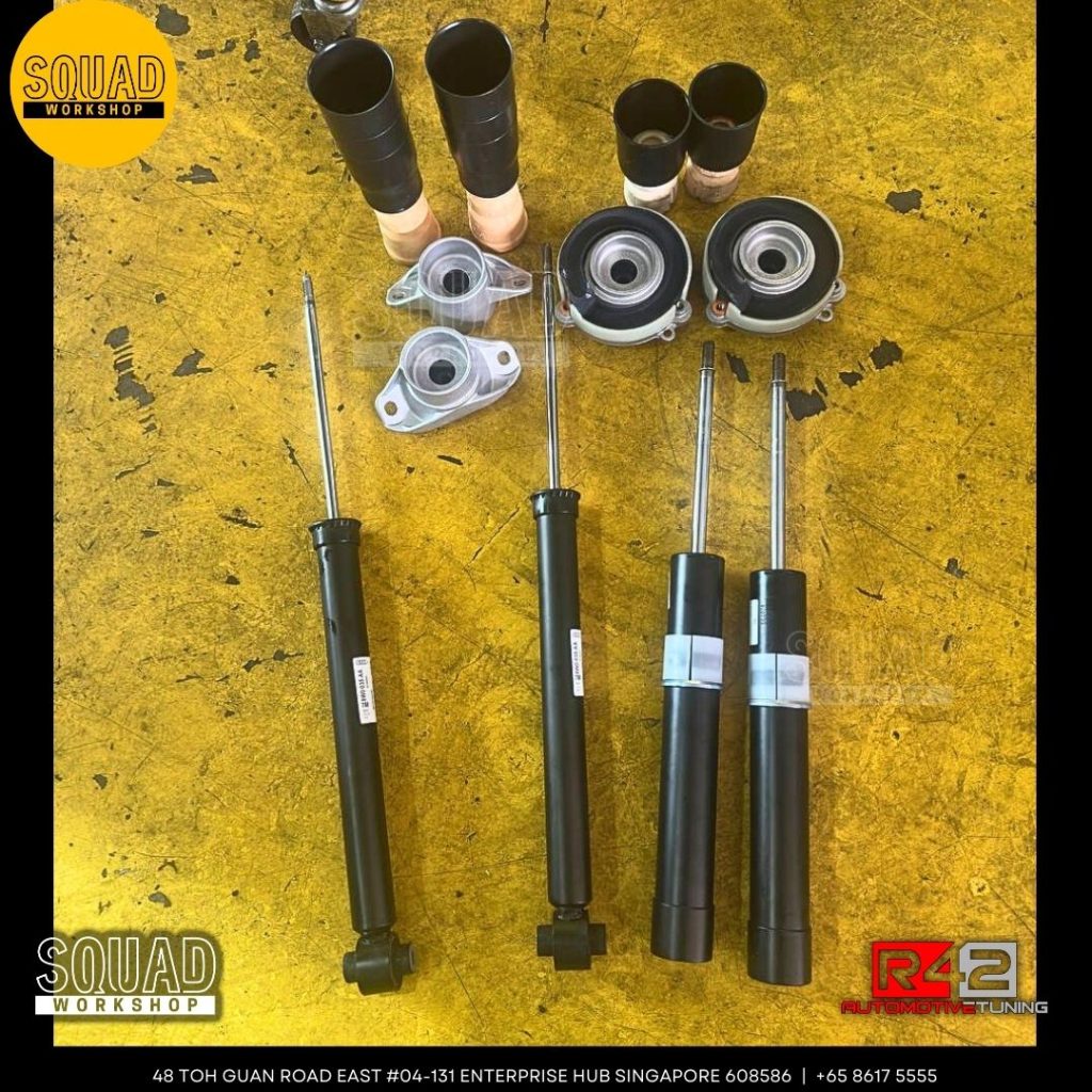 Audi A4 B9 undergoing suspension absorber, control arm, and engine gearbox mounting replacement with original Volkswagen parts at Squad Workshop Singapore
