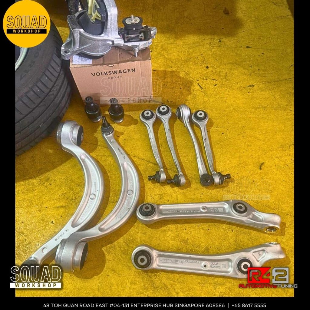 Audi A4 B9 undergoing suspension absorber, control arm, and engine gearbox mounting replacement with original Volkswagen parts at Squad Workshop Singapore