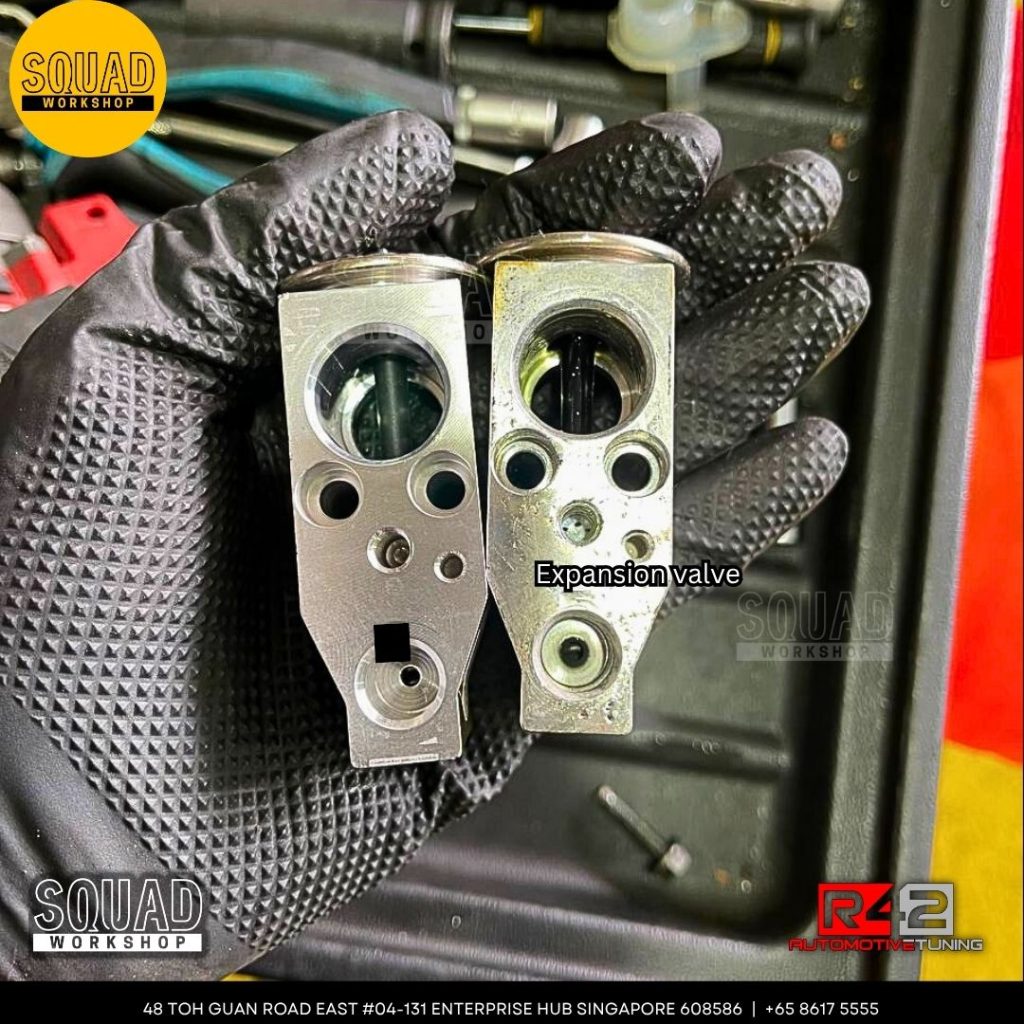 Nissan Qashqai J11 undergoing air-con compressor, expansion valve, and coolant hose replacement at Squad Workshop Singapore
