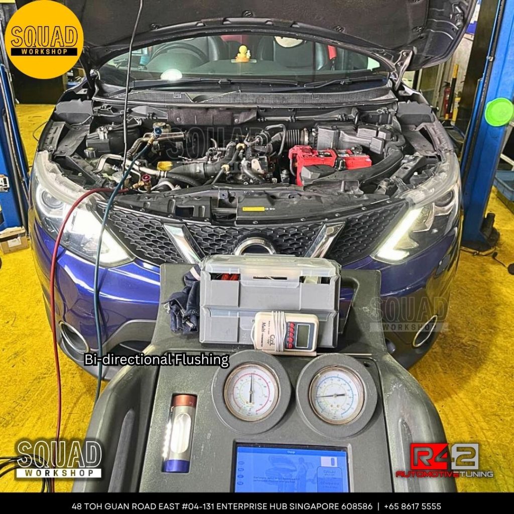 Nissan Qashqai J11 undergoing air-con compressor, expansion valve, and coolant hose replacement at Squad Workshop Singapore